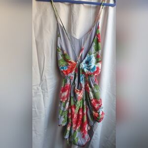 Cotton Candy Floral Jumpsuit with Red and Green Accents